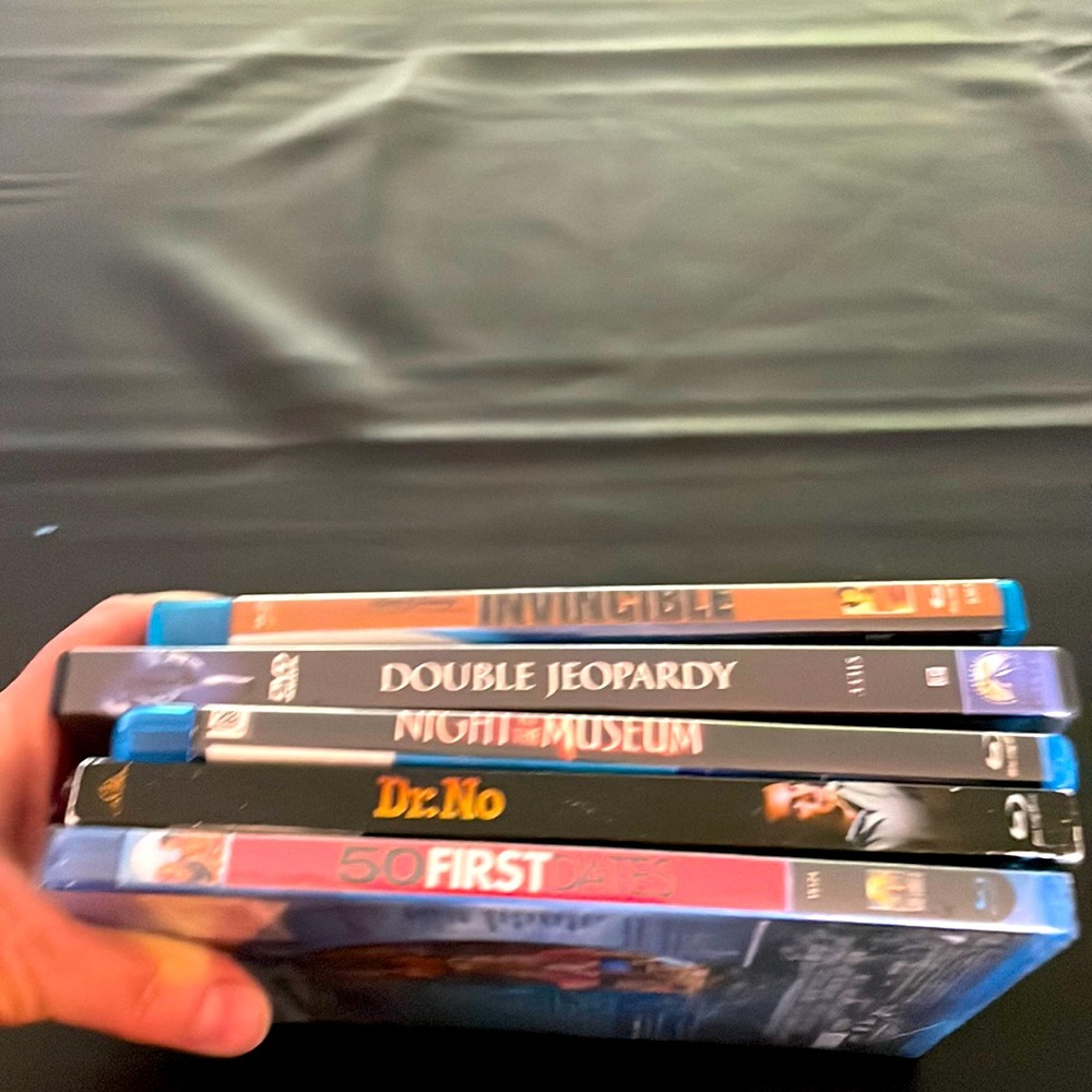 Set of 5 Blu-Ray discs and DVDs